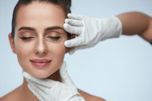 A woman undergoes eyelid surgery.